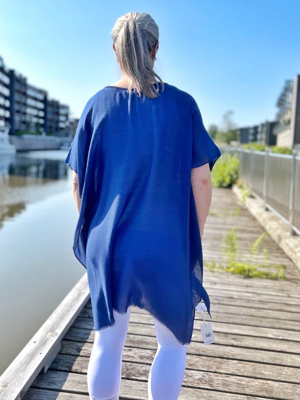 Strand-poncho blå